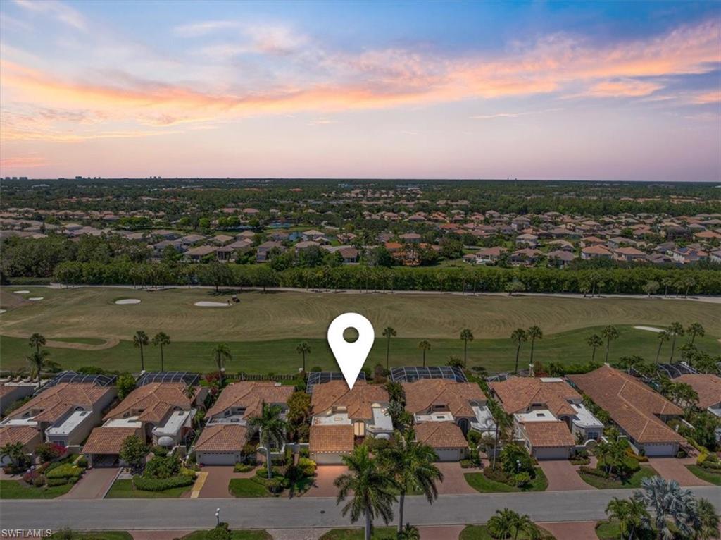 171 Via Napoli Naples, FL 34105 - Photo 37 of 45 an aerial view of a house with a lake view