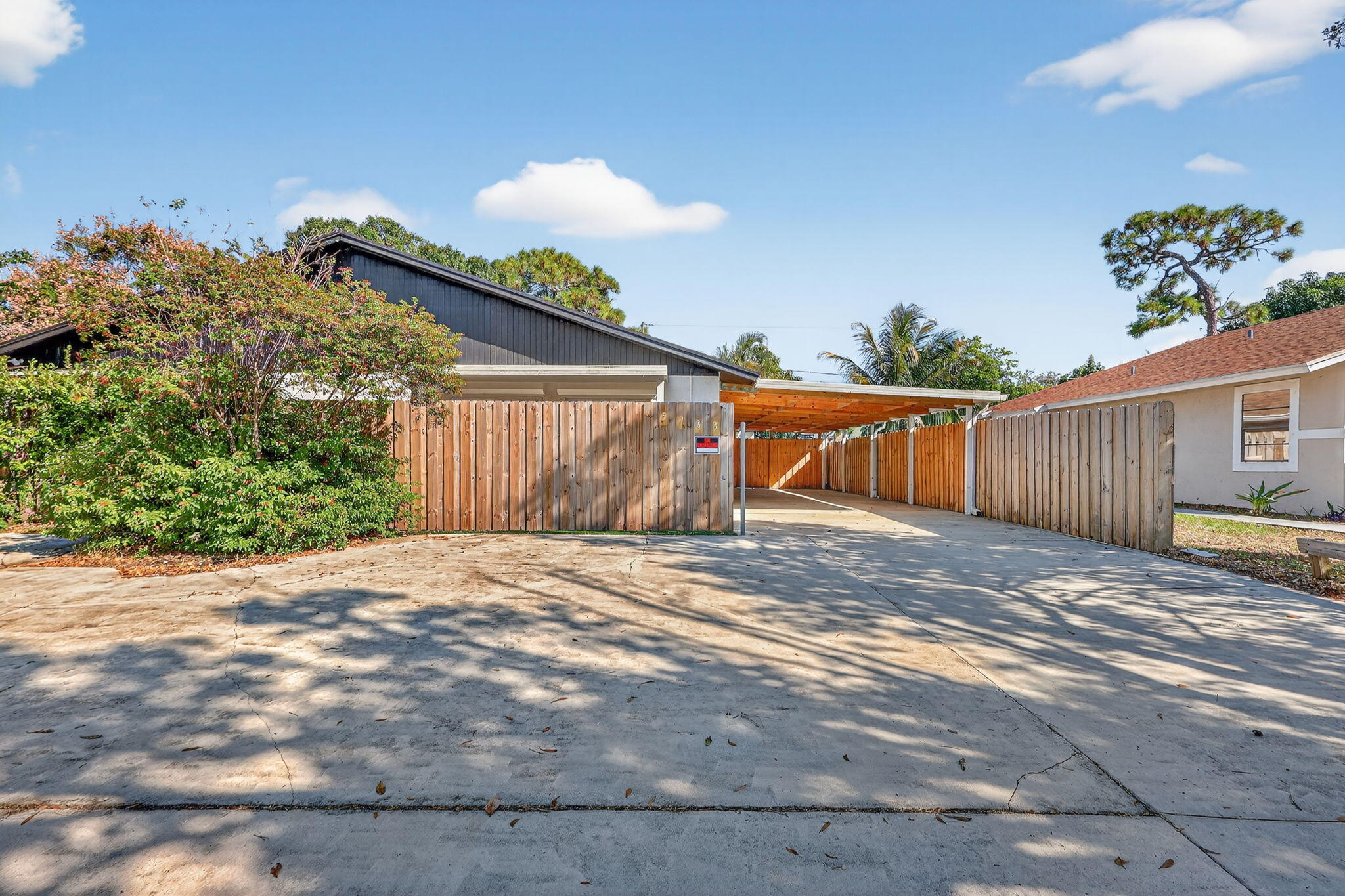 5785 Southeast Collins Avenue Stuart, FL 34997 - Photo 3 of 49 a view of a backyard of a house
