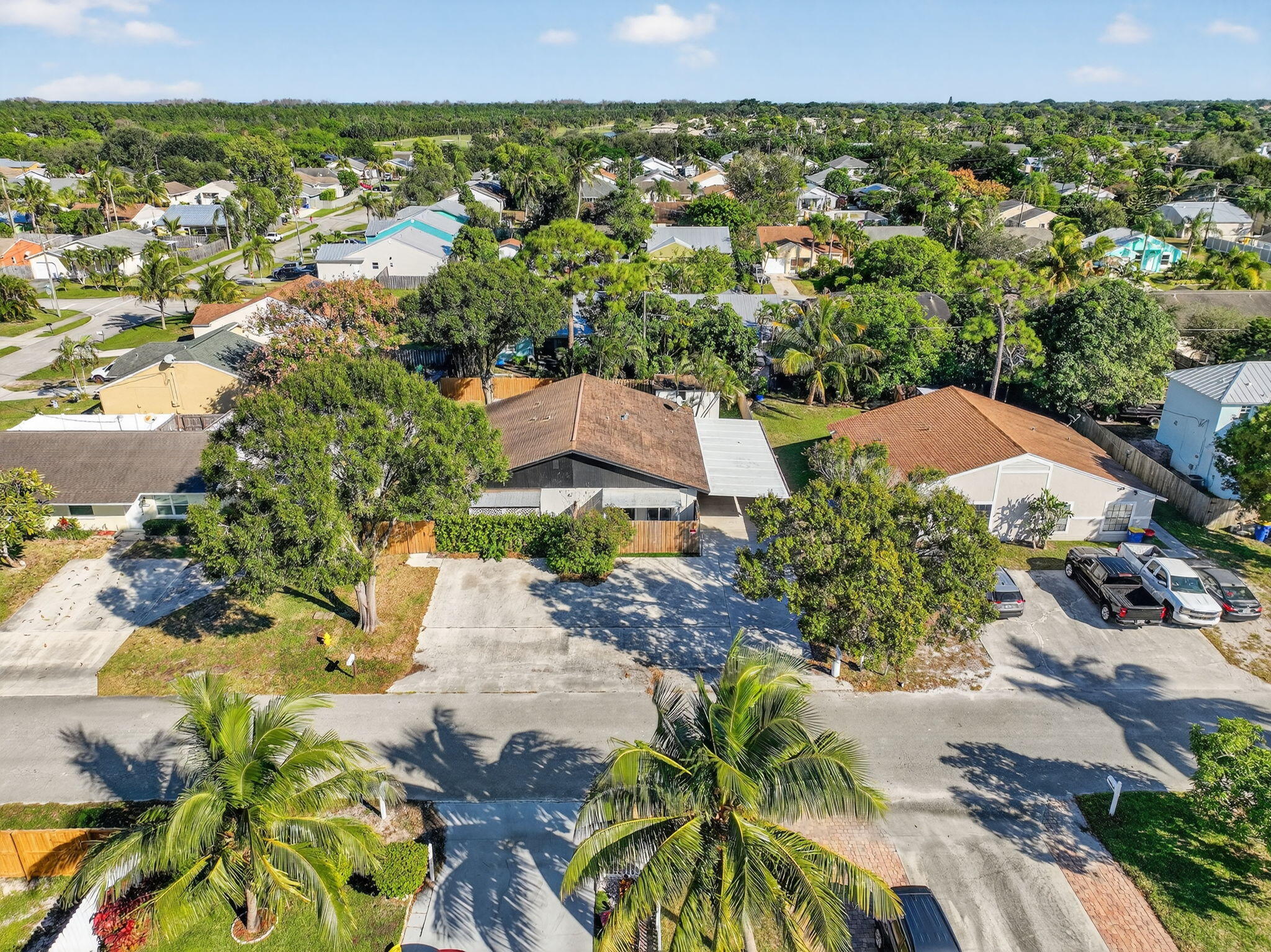 5785 Southeast Collins Avenue Stuart, FL 34997 - Photo 43 of 49 an aerial view of residential houses with outdoor space