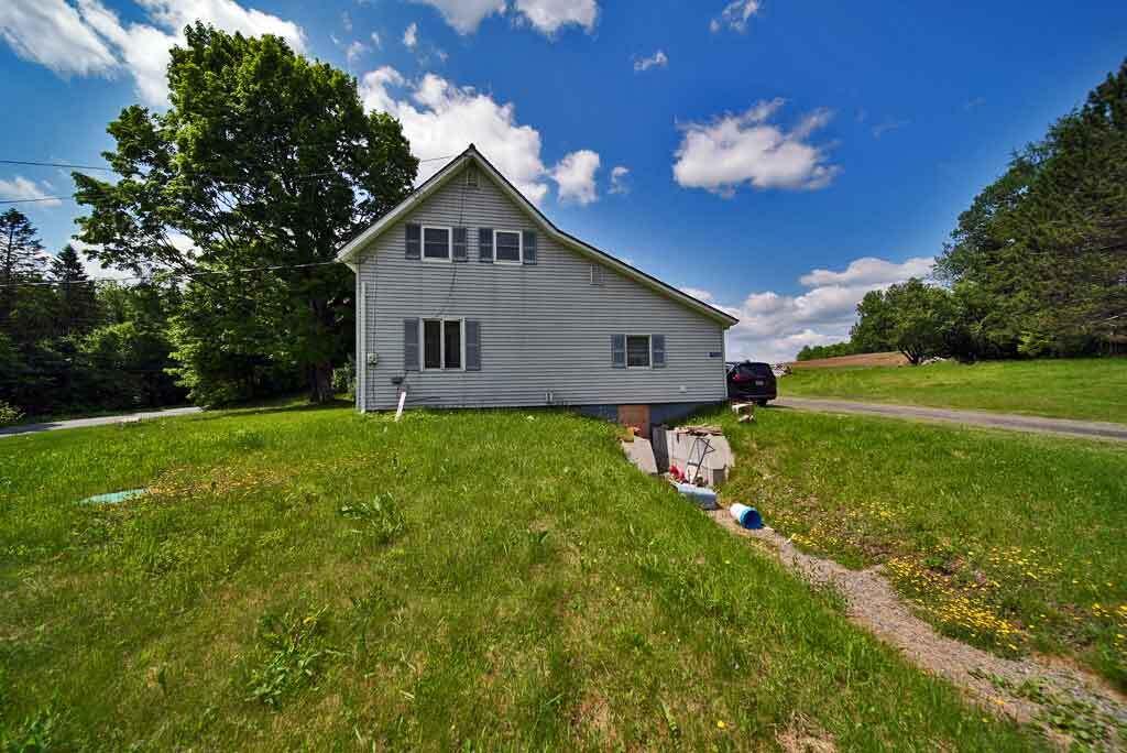 1115 Bangor Road Linneus, ME 04730 - Photo 9 of 16 vinyl-siding-outside-entran
