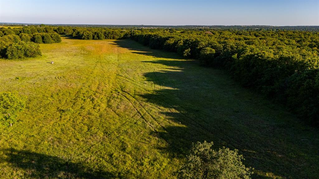 18100 Farm To Market 920 Poolville, TX 76487 - Photo 23 of 32 a view of an ocean from a building