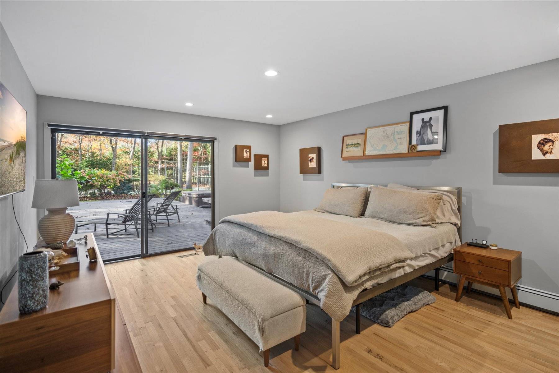 25 North Quarter Road Westhampton, NY 11977 - Photo 16 of 27 a spacious bedroom with a bed and a large window