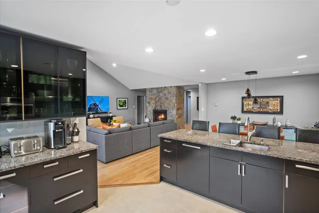 a kitchen with granite countertop lots of counter top space