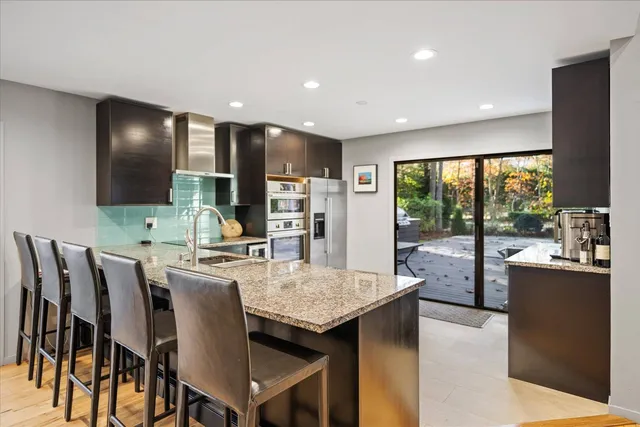 a kitchen with granite countertop lots of counter top space