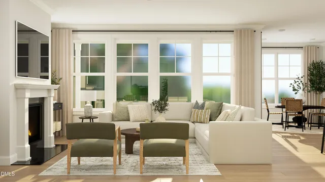 a living room with fireplace furniture and a large window