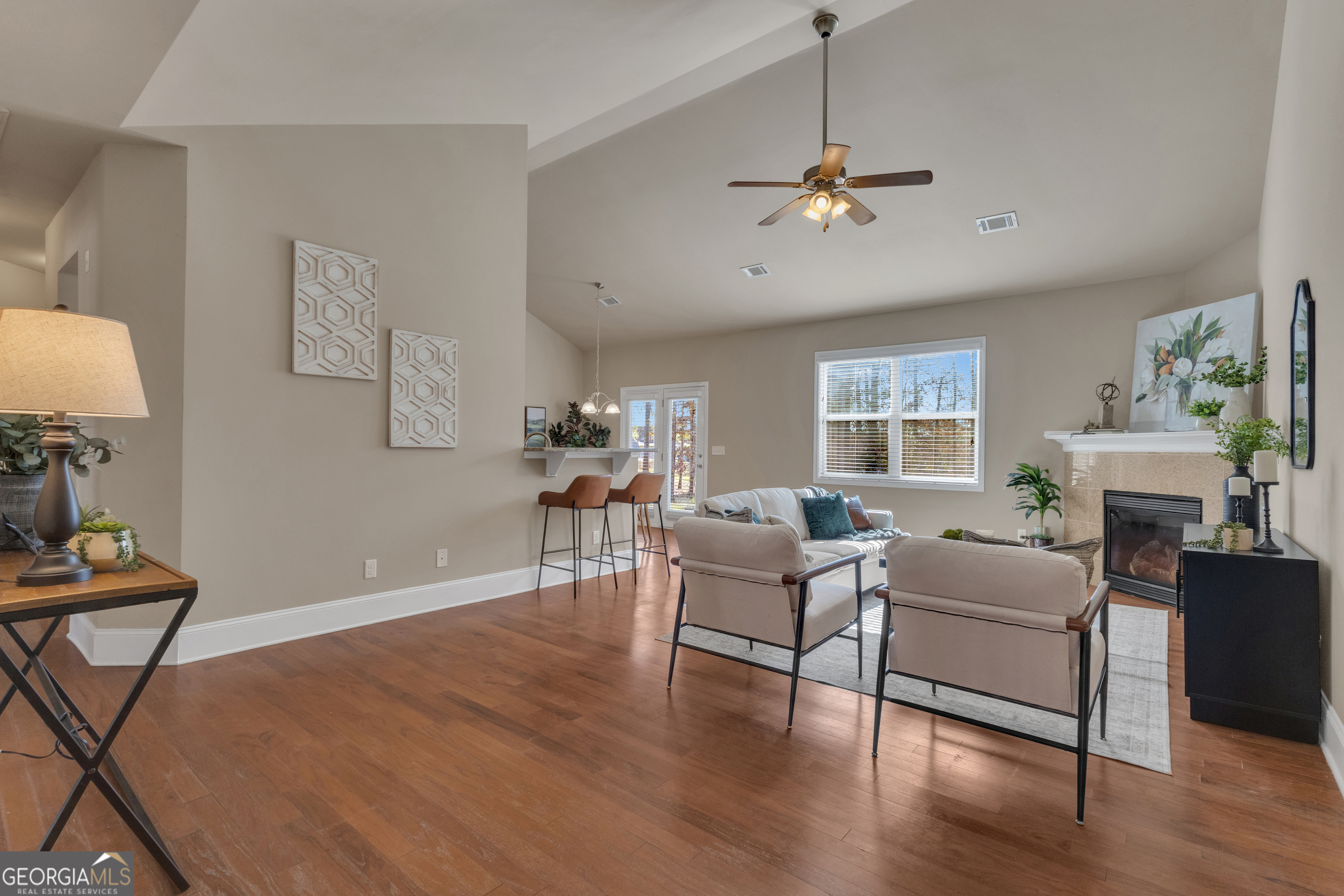 170 Savannah Drive Senoia, GA 30276 - Photo 17 of 60 a living room with furniture a window and a flat screen tv