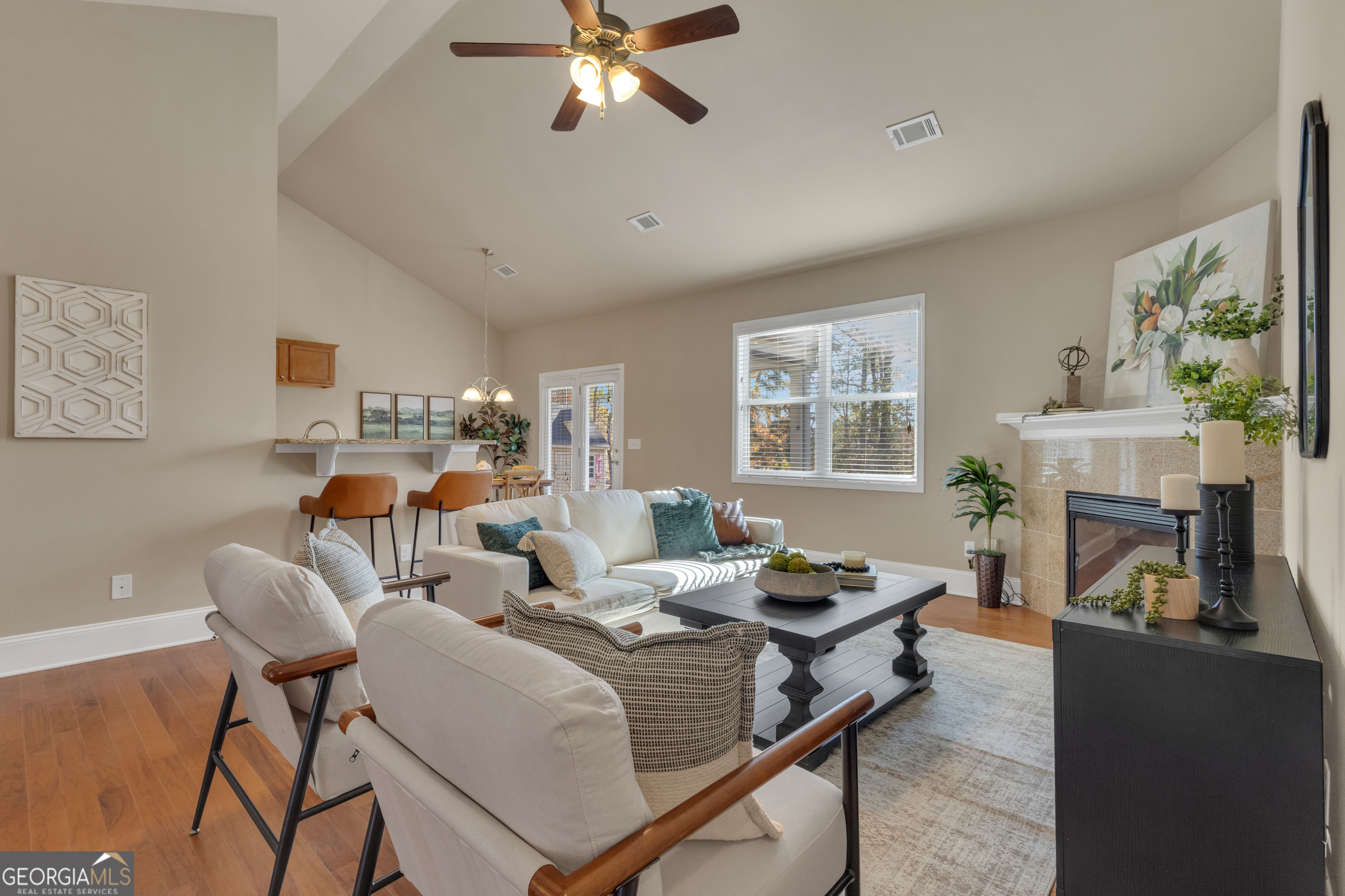 170 Savannah Drive Senoia, GA 30276 - Photo 18 of 60 a living room with fireplace furniture and a window