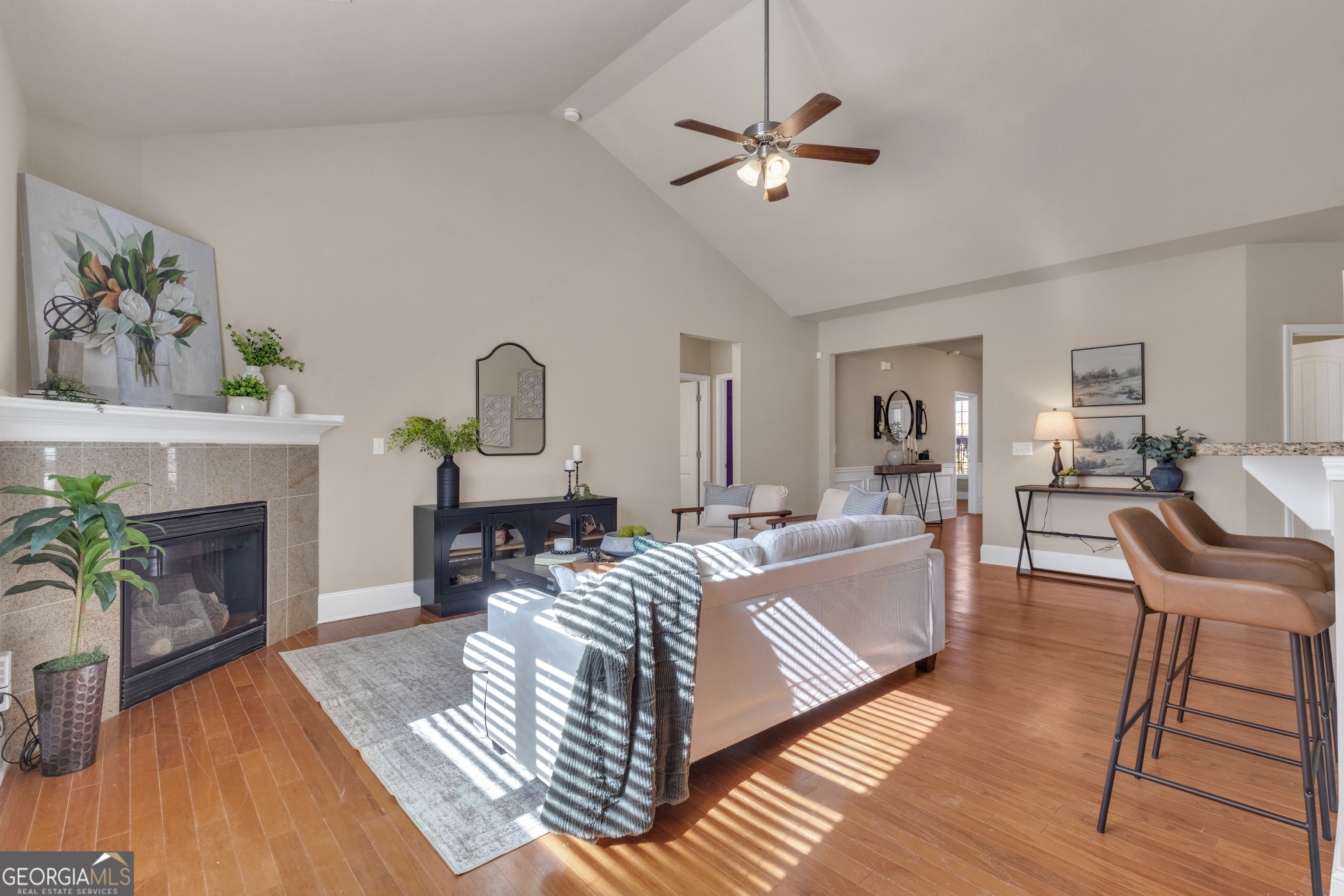 170 Savannah Drive Senoia, GA 30276 - Photo 21 of 60 a living room with furniture and a fireplace