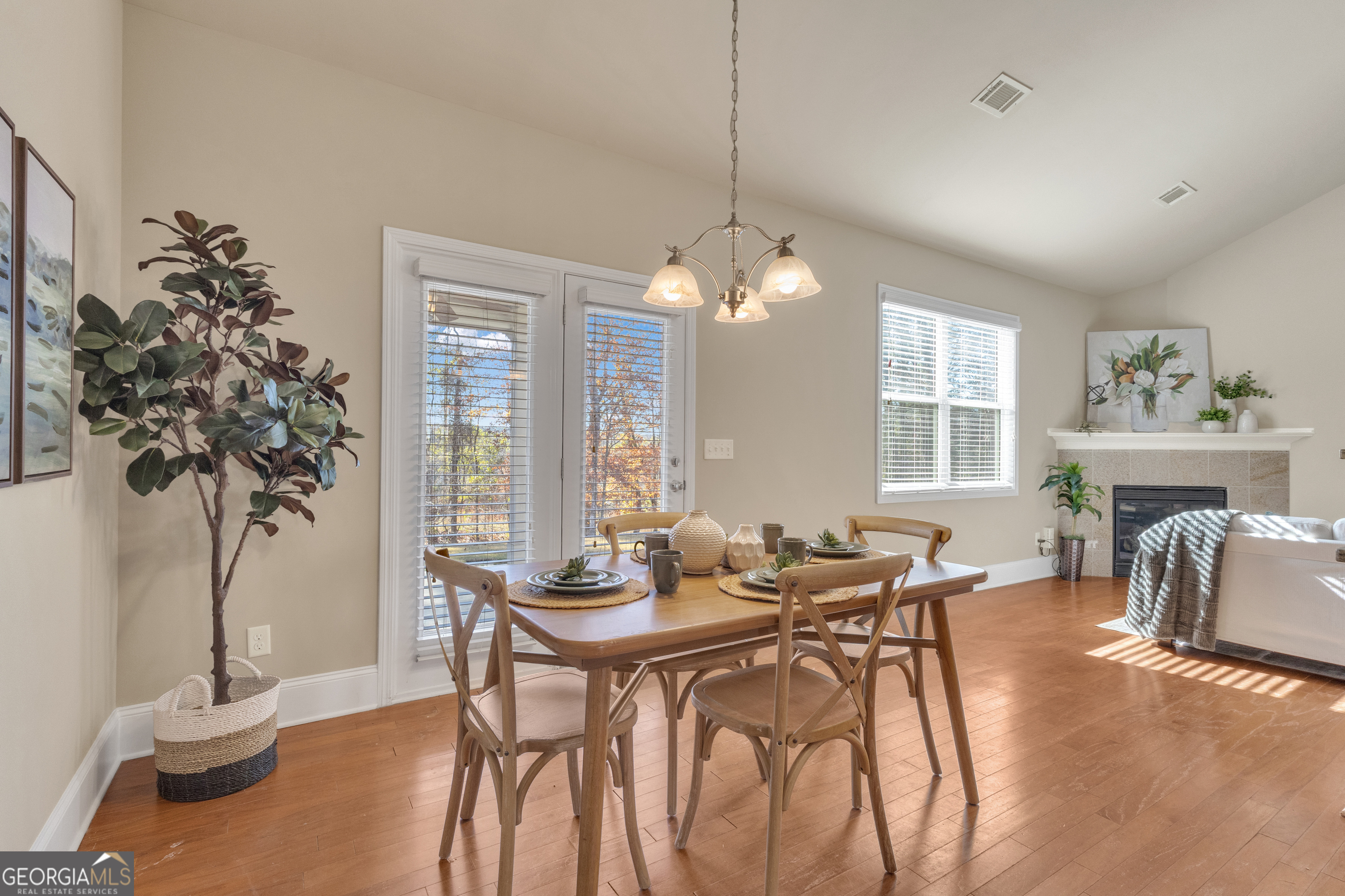 170 Savannah Drive Senoia, GA 30276 - Photo 25 of 60 a view of a dining room with furniture window and wooden floor