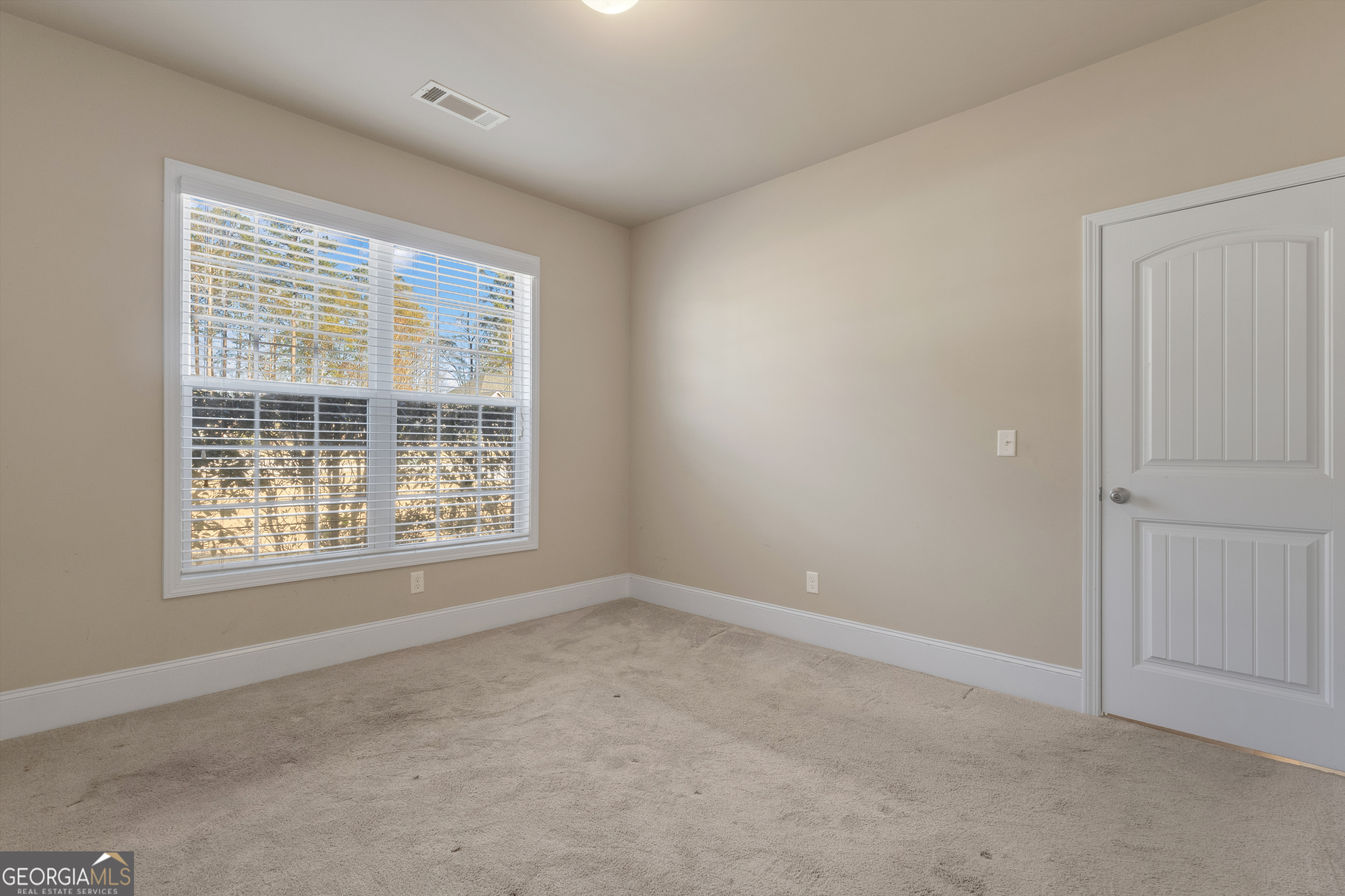 170 Savannah Drive Senoia, GA 30276 - Photo 32 of 60 an empty room with a window