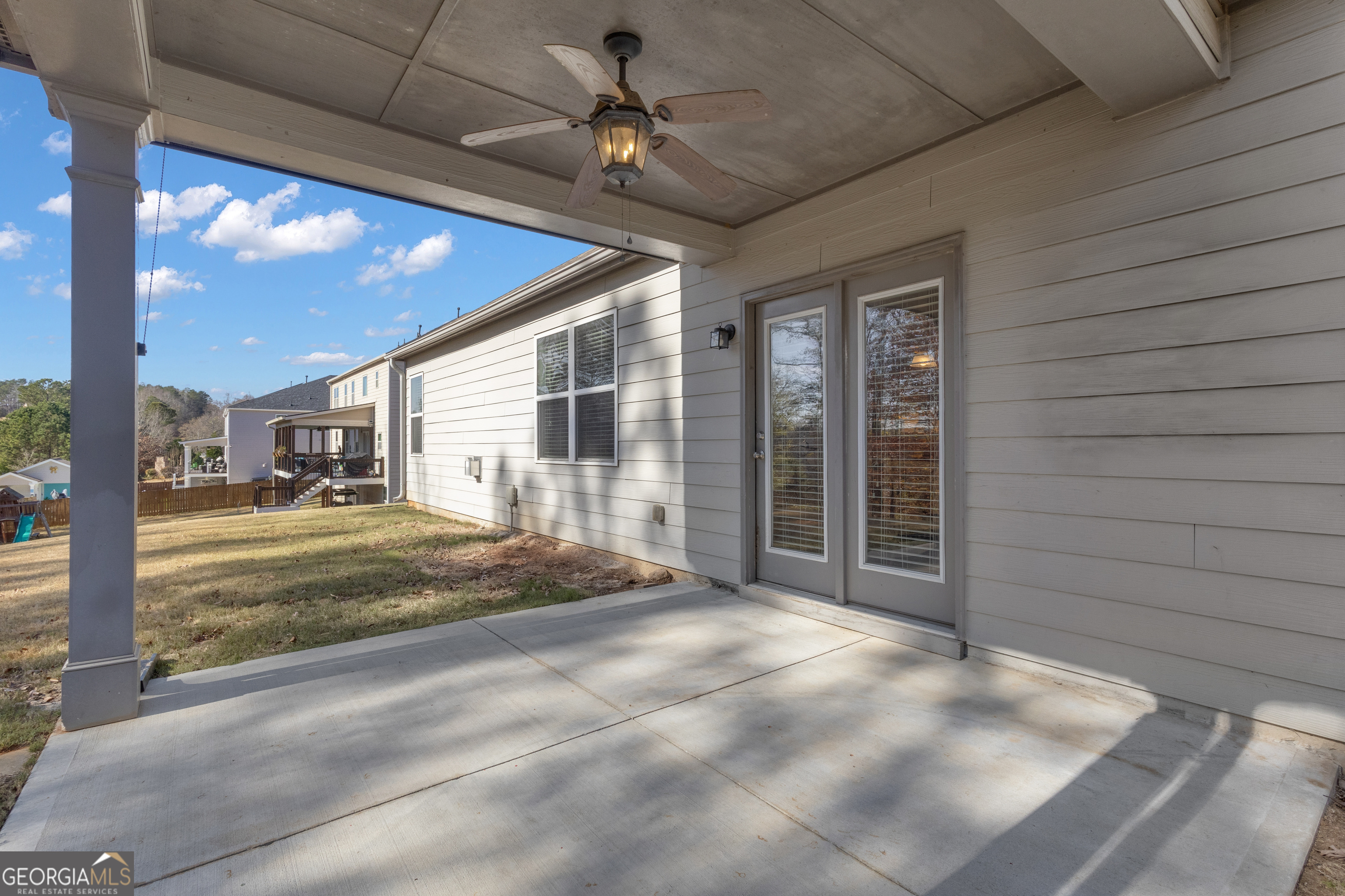 170 Savannah Drive Senoia, GA 30276 - Photo 38 of 60 a view of a porch with a table and chairs