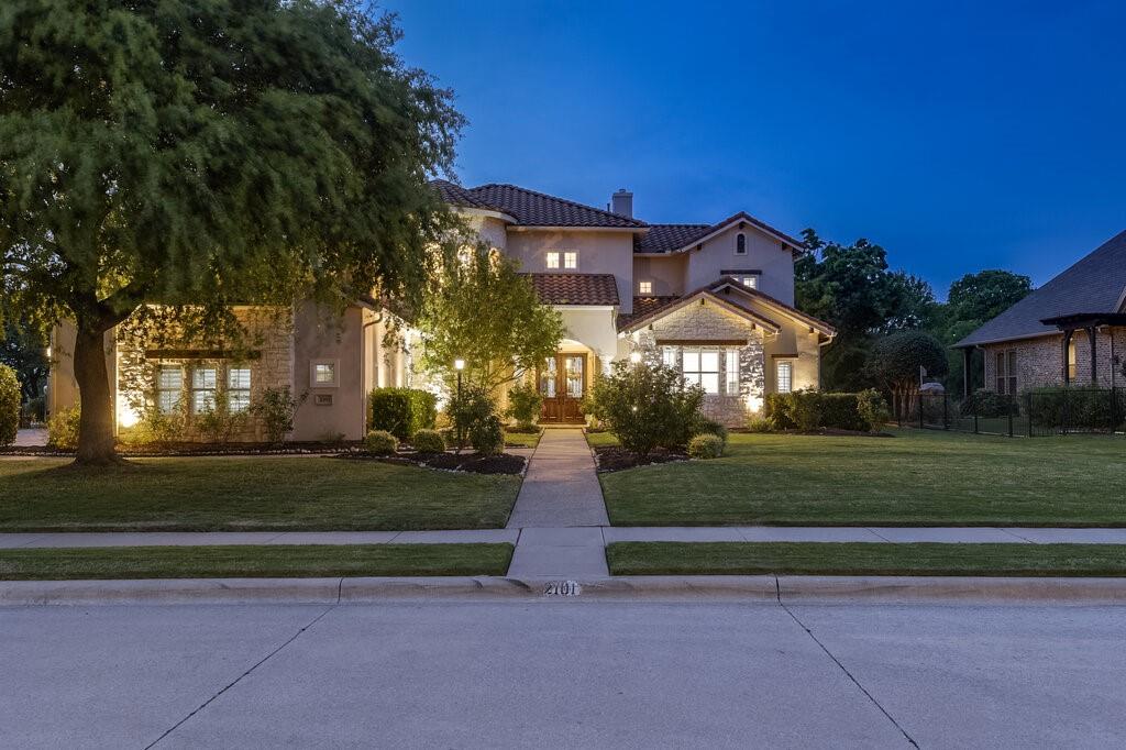 2101 Zavala Road Keller, TX 76248 - Photo 1 of 38 a front view of a house with a yard and an fountain