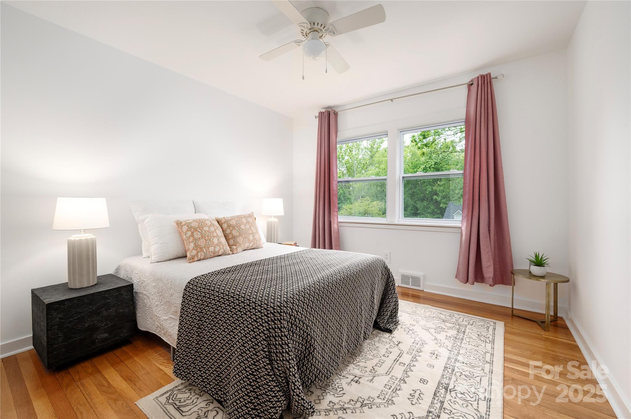 12 Canterbury Road Asheville, NC 28805 - Photo 21 of 44 a bedroom with a bed and a window