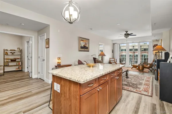 an open kitchen with a table and chairs in it