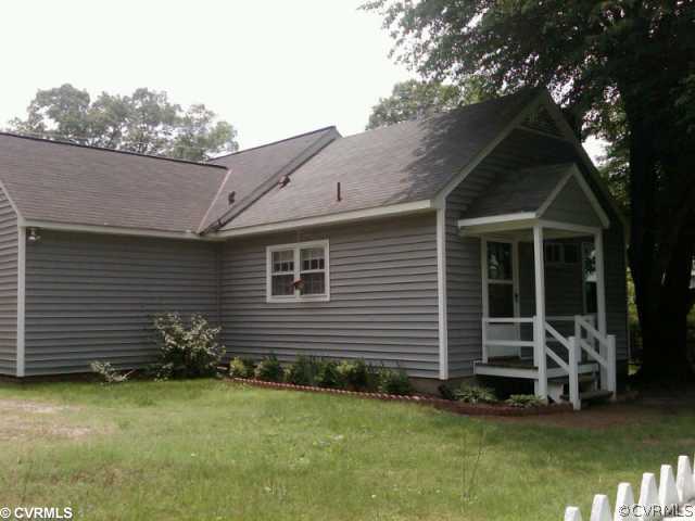 3528 West Hundred Road Chester, VA 23831 - Photo 2 of 5 a front view of a house with garden