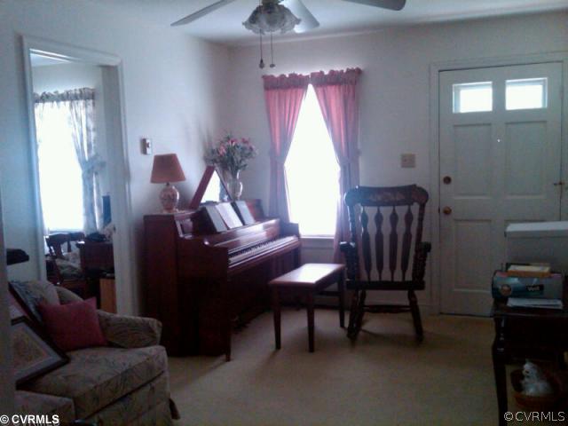 3528 West Hundred Road Chester, VA 23831 - Photo 4 of 5 a living room with furniture and a window
