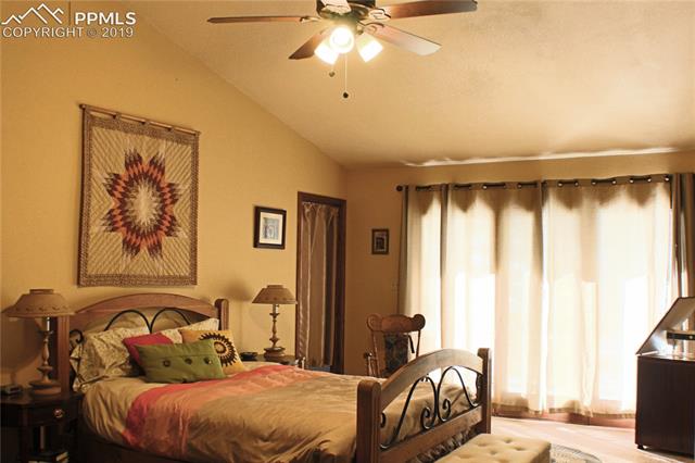 Master retreat with vaulted ceilings & walk out