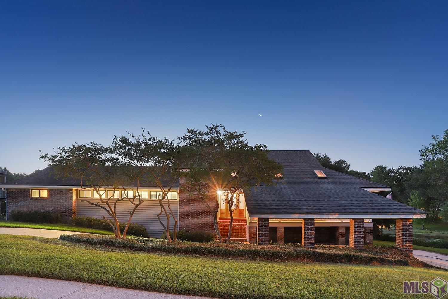 11675 Rue De Tonti Baton Rouge, LA 70810 - Photo 3 of 32 Dusk Front View of Home