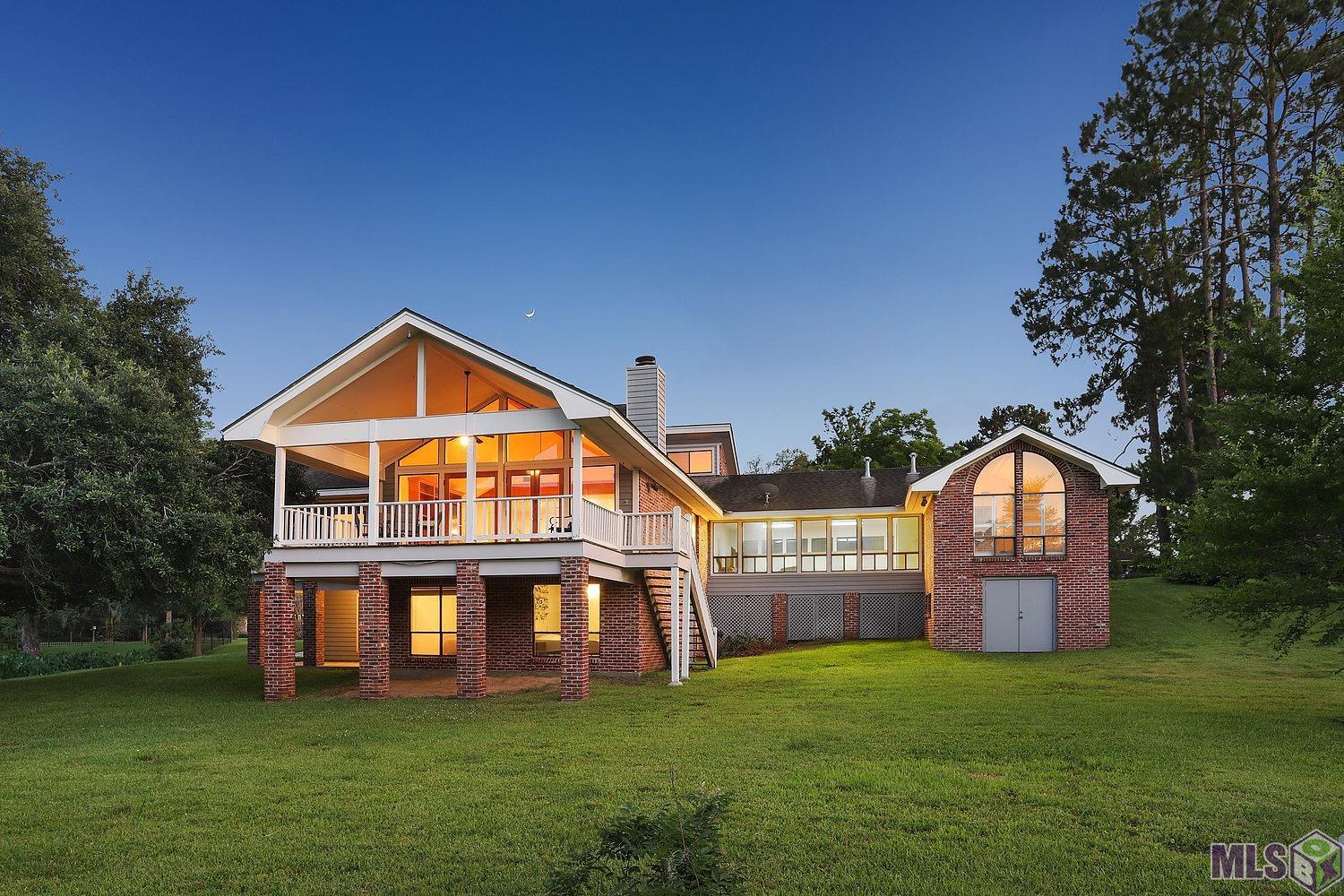 11675 Rue De Tonti Baton Rouge, LA 70810 - Photo 6 of 32 Dusk Back View of Home