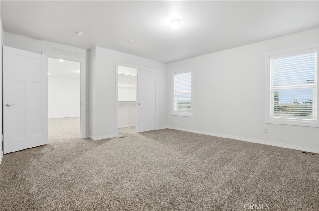 4237 Del Rosa Road Phelan, CA 92371 - Photo 27 of 37 an empty room with windows