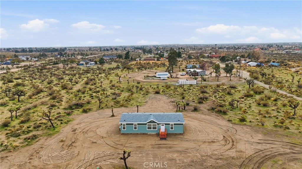 4237 Del Rosa Road Phelan, CA 92371 - Photo 37 of 37 an aerial view of a city with lots of residential buildings