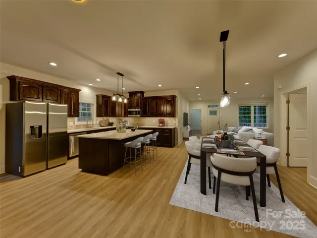 a living room with furniture and a table