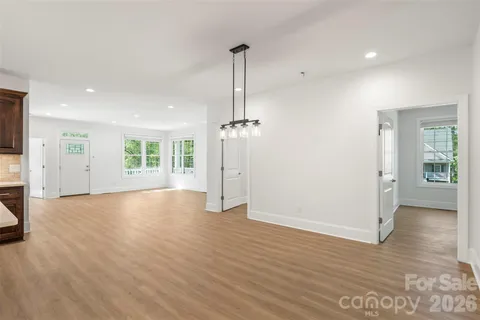 a bathroom with double vanity sinks and a mirror