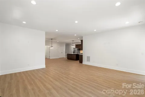 a bathroom with a shower and a toilet