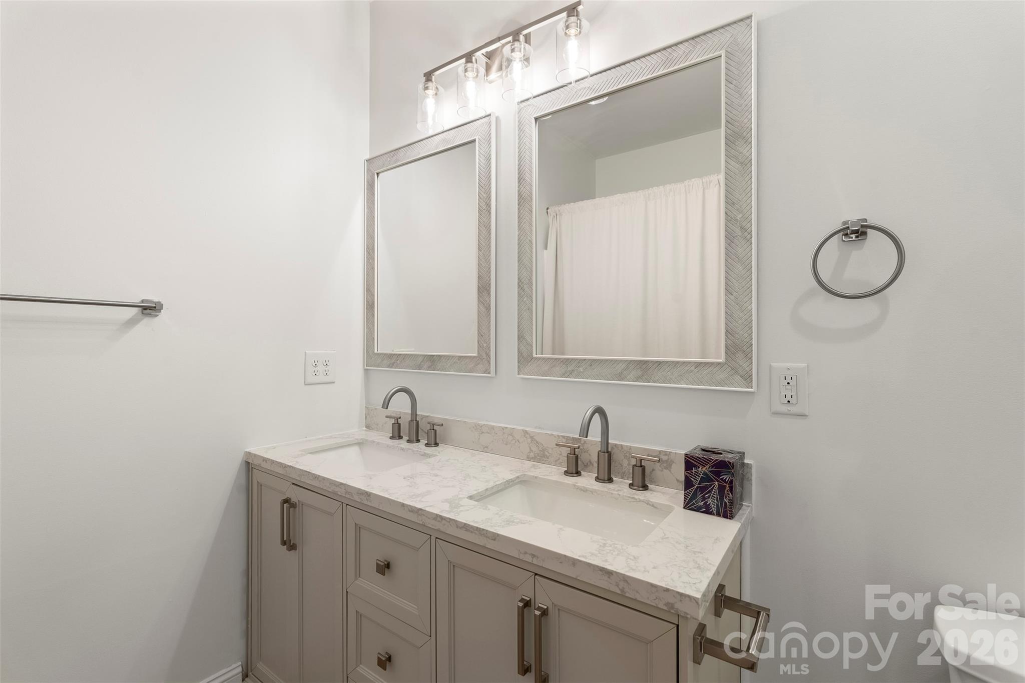 206 Montclair Drive Locust, NC 28097 - Photo 29 of 40 a bathroom with a sink and a mirror