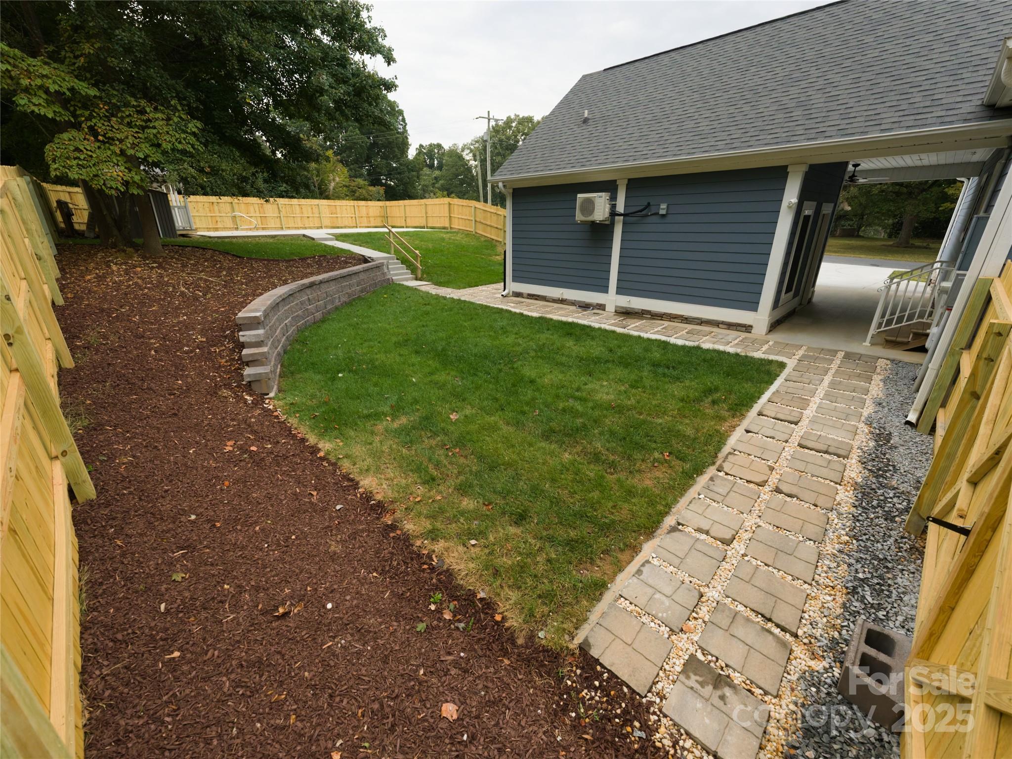 206 Montclair Drive Locust, NC 28097 - Photo 9 of 46 a backyard of a house with lots of green space