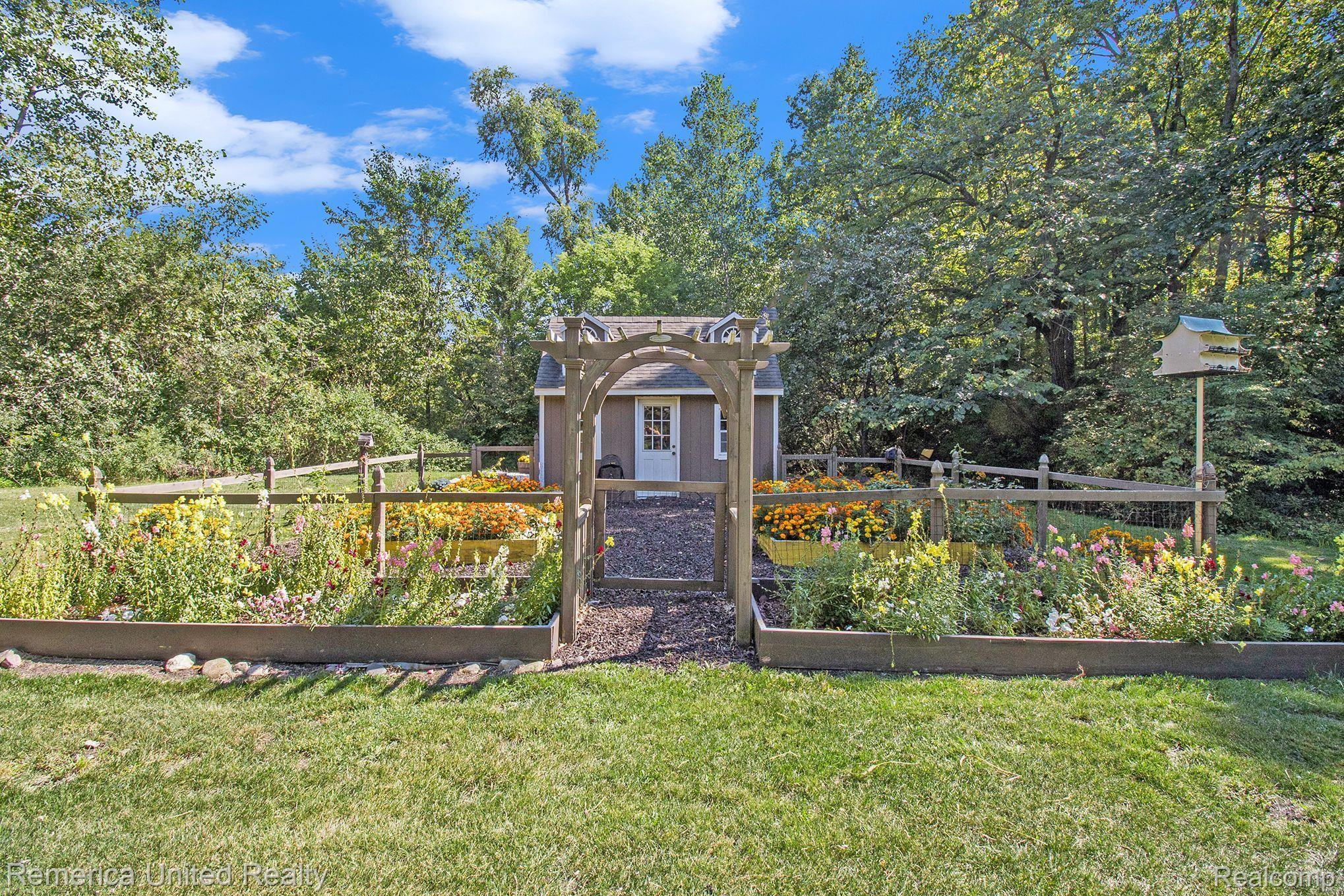3470 East Highland Road Howell, MI 48843 - Photo 59 of 66 Flower Garden & Potting Shed