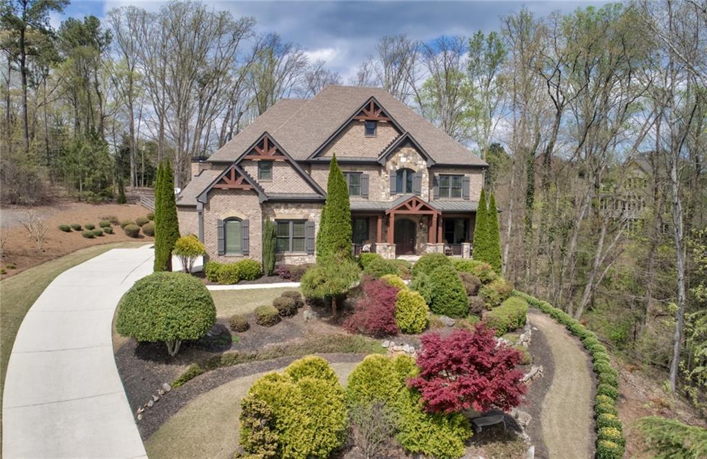 2420 Wayward Run Cumming, GA 30041 - Photo 1 of 1 Come and see this amazing craftsman home, with beautiful landscaping and a private drive. The curb appeal is gorgeous and so pleasing.