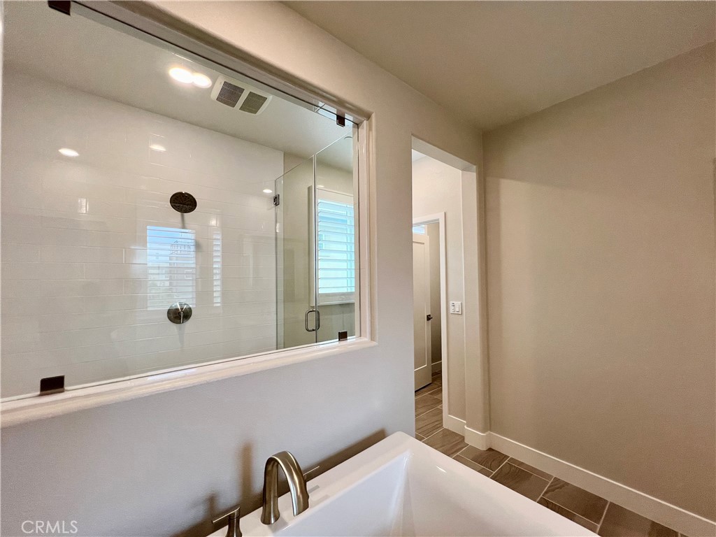 108 Chorus Irvine, CA 92618 - Photo 18 of 39 a bathroom with a sink and a mirror