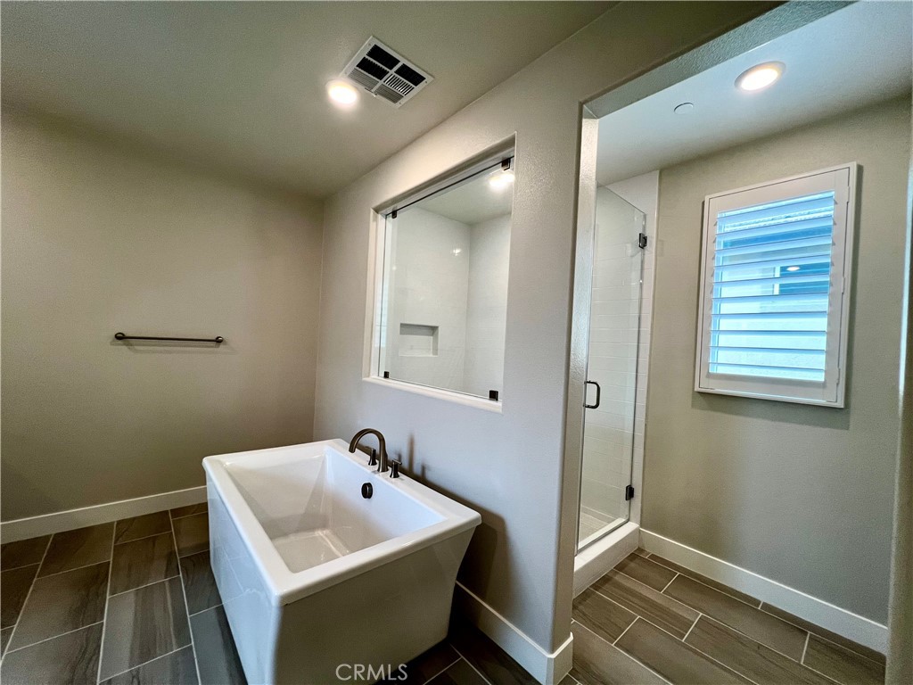 108 Chorus Irvine, CA 92618 - Photo 20 of 39 a bathroom with a sink and mirror