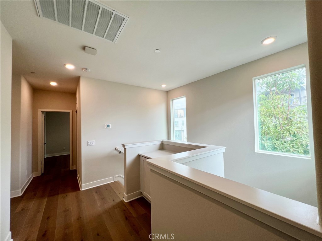 108 Chorus Irvine, CA 92618 - Photo 29 of 39 a bathroom with a sink a toilet and a window