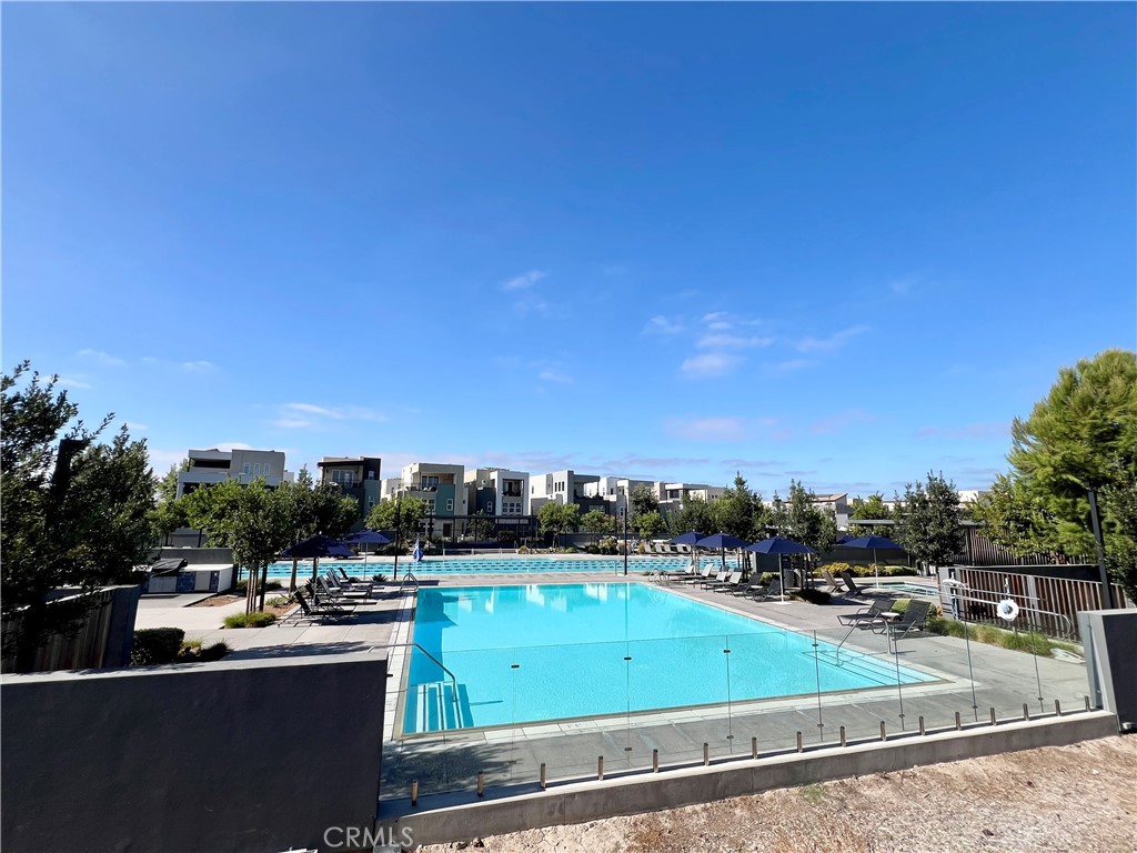 108 Chorus Irvine, CA 92618 - Photo 32 of 39 a view of a swimming pool and a chairs
