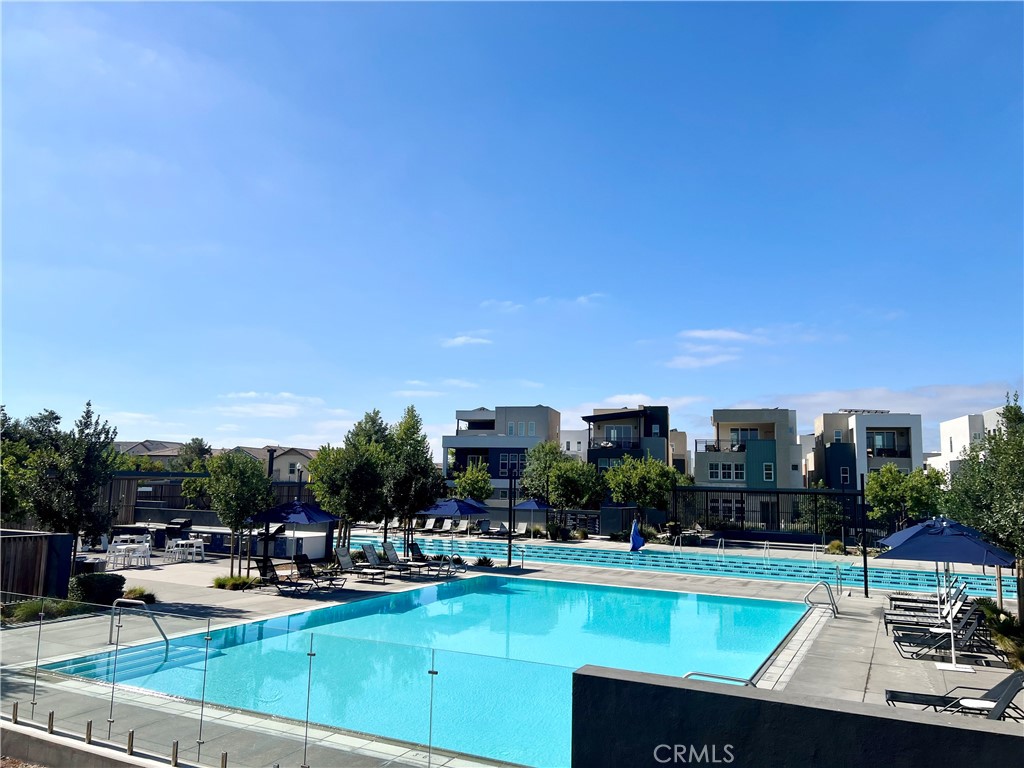108 Chorus Irvine, CA 92618 - Photo 33 of 39 a view of a swimming pool and chairs