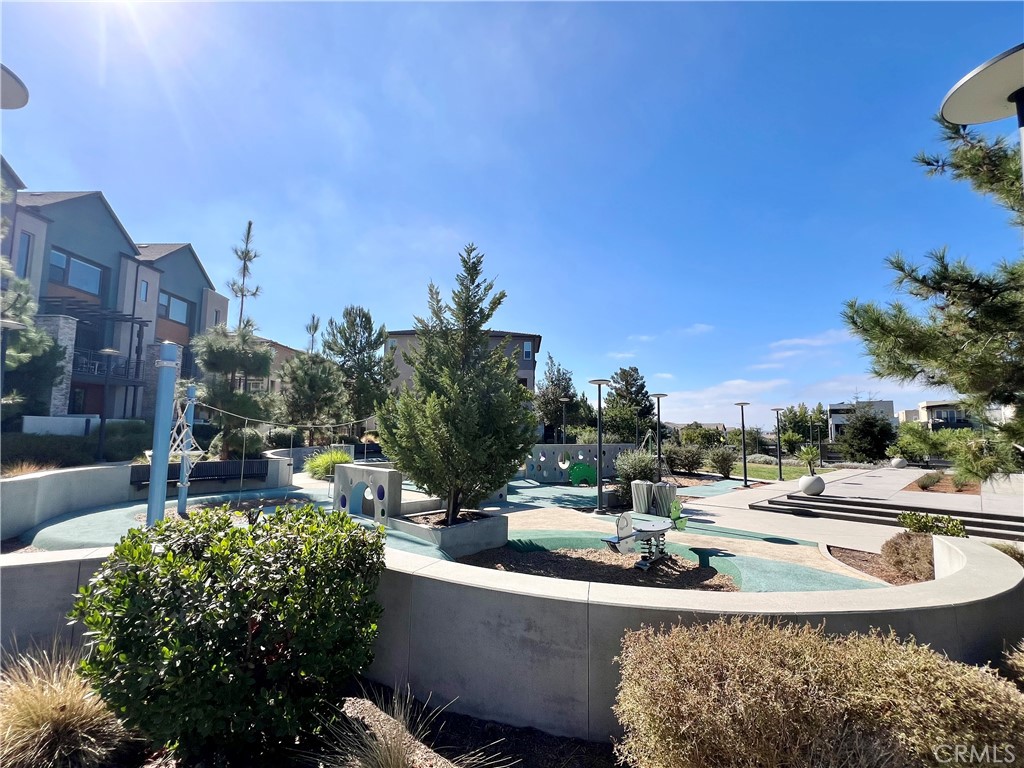 108 Chorus Irvine, CA 92618 - Photo 37 of 39 a view of a swimming pool with a patio