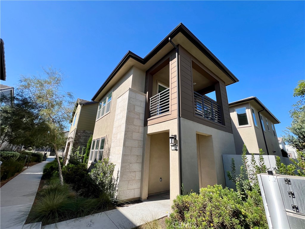 108 Chorus Irvine, CA 92618 - Photo 39 of 39 a front view of a house with a yard