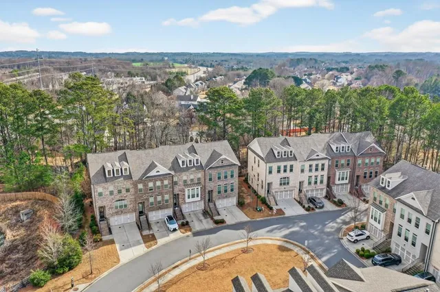 an aerial view of a chairs and table on the terrace