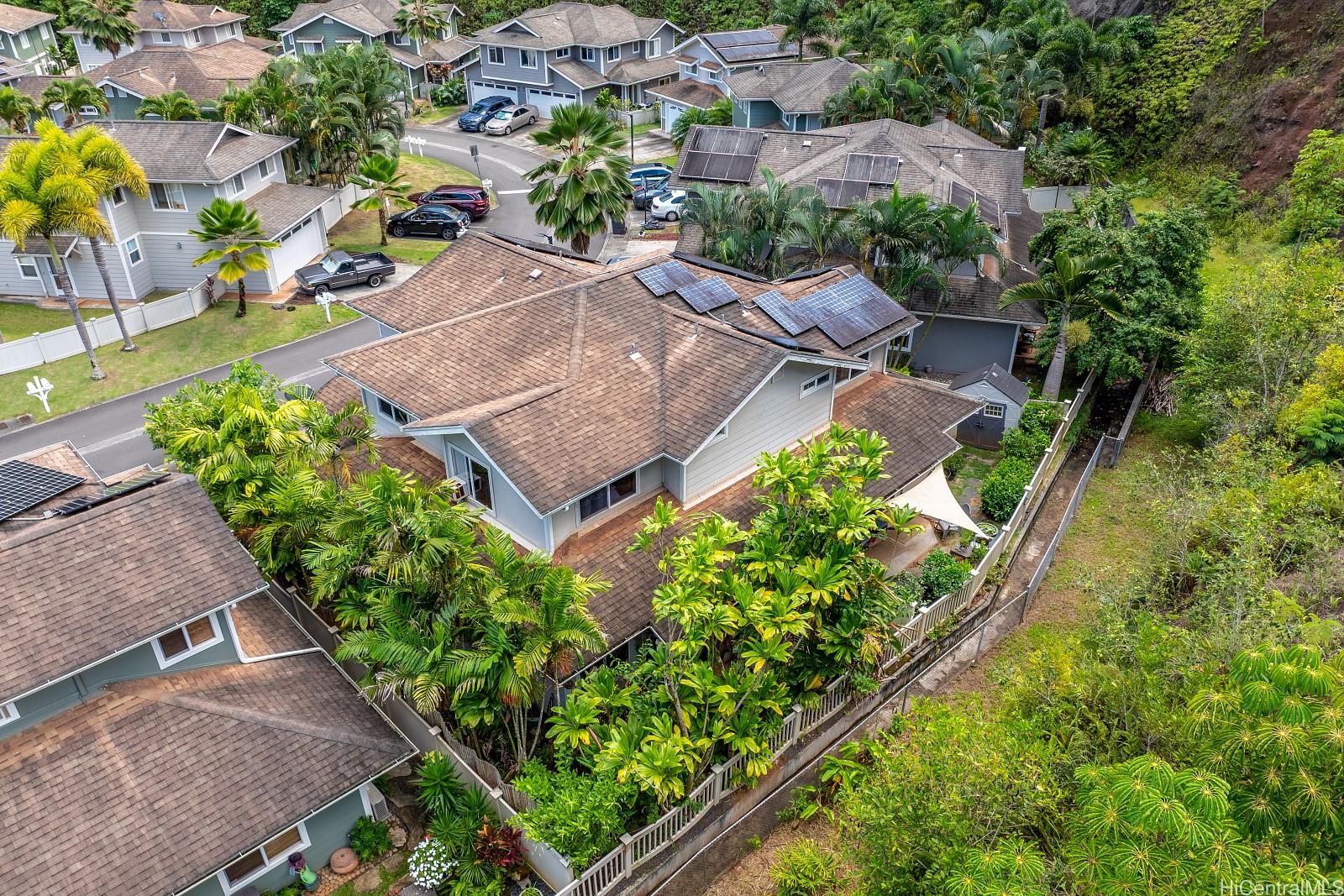 an aerial view of a house with a garden