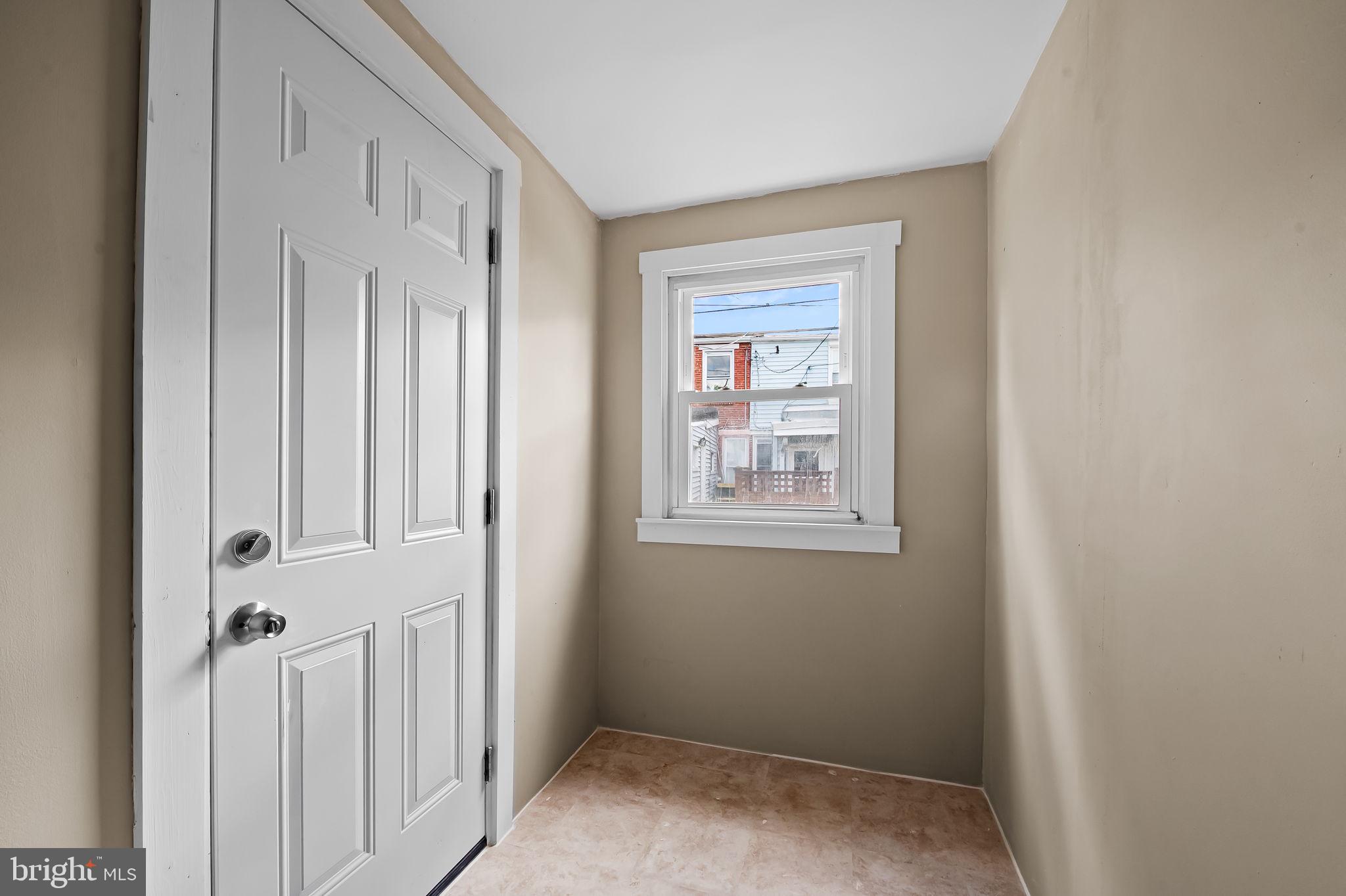 3432 Roland Avenue Baltimore, MD 21211 - Photo 12 of 28 mudroom cold storage off kitchen