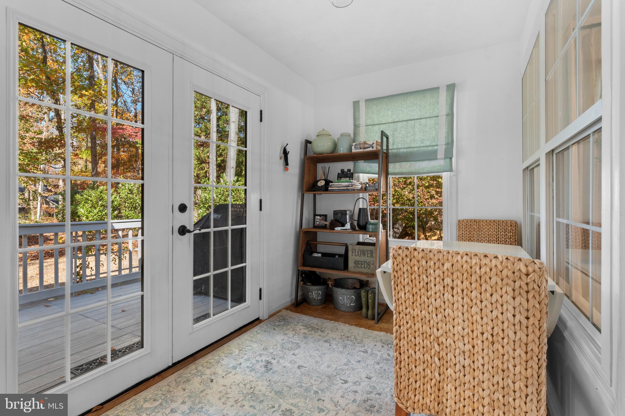 214 Monument Road Locust Grove, VA 22508 - Photo 11 of 48 Bright sunroom with charming outdoor views.