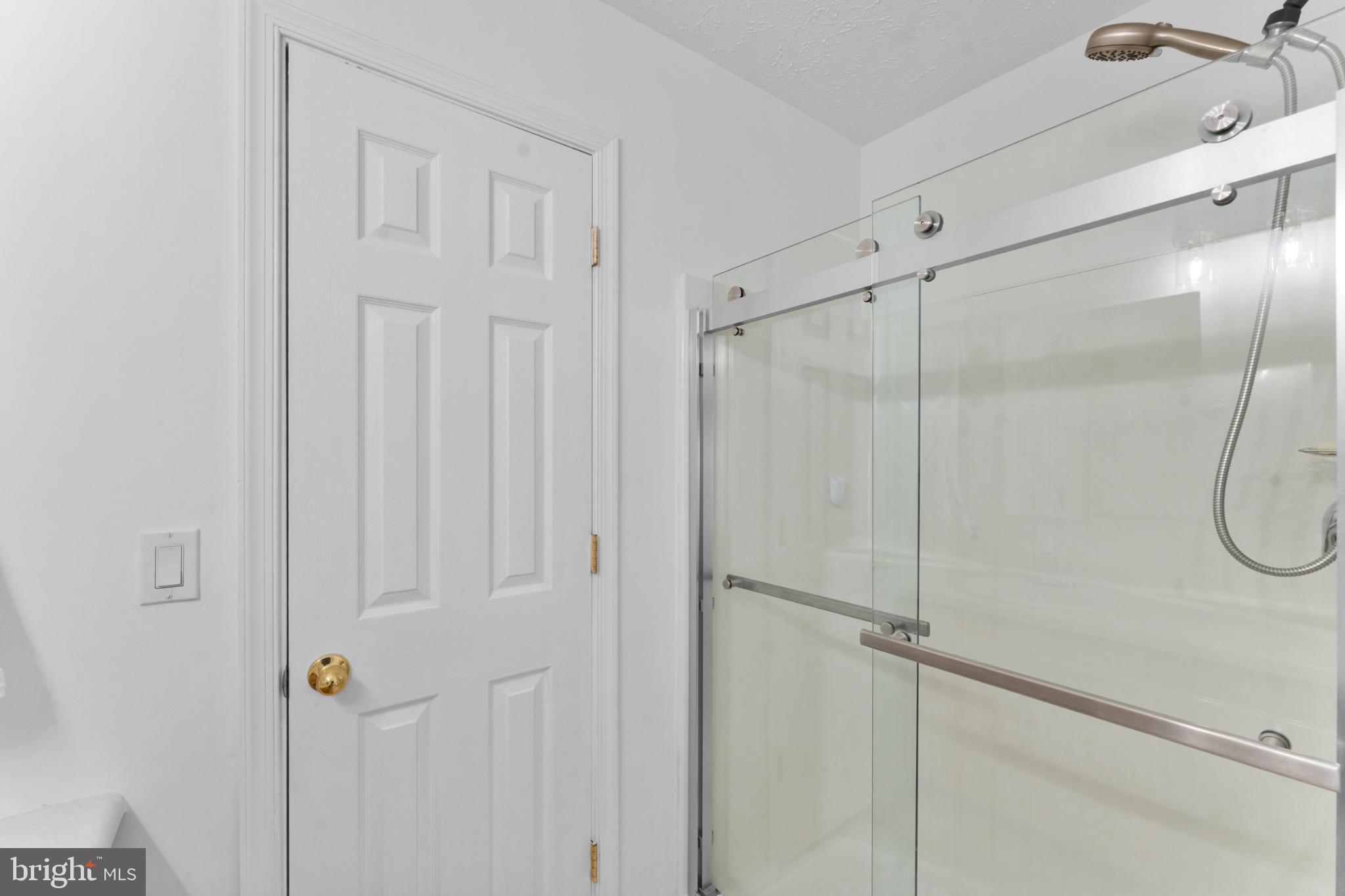 214 Monument Road Locust Grove, VA 22508 - Photo 32 of 48 Sleek bathroom with modern glass shower.
