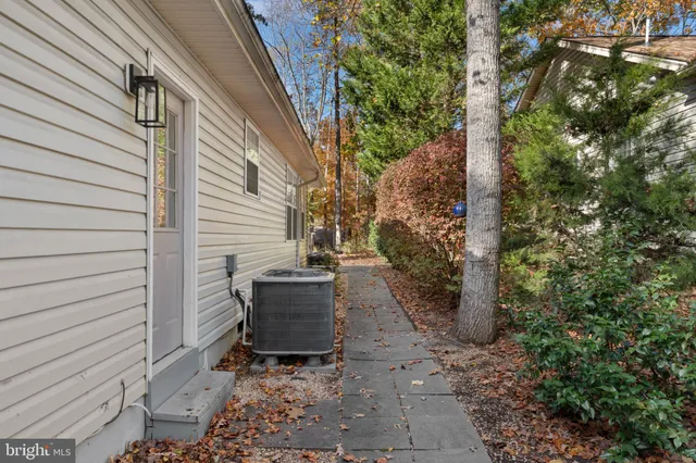 a view of a deck with a backyard