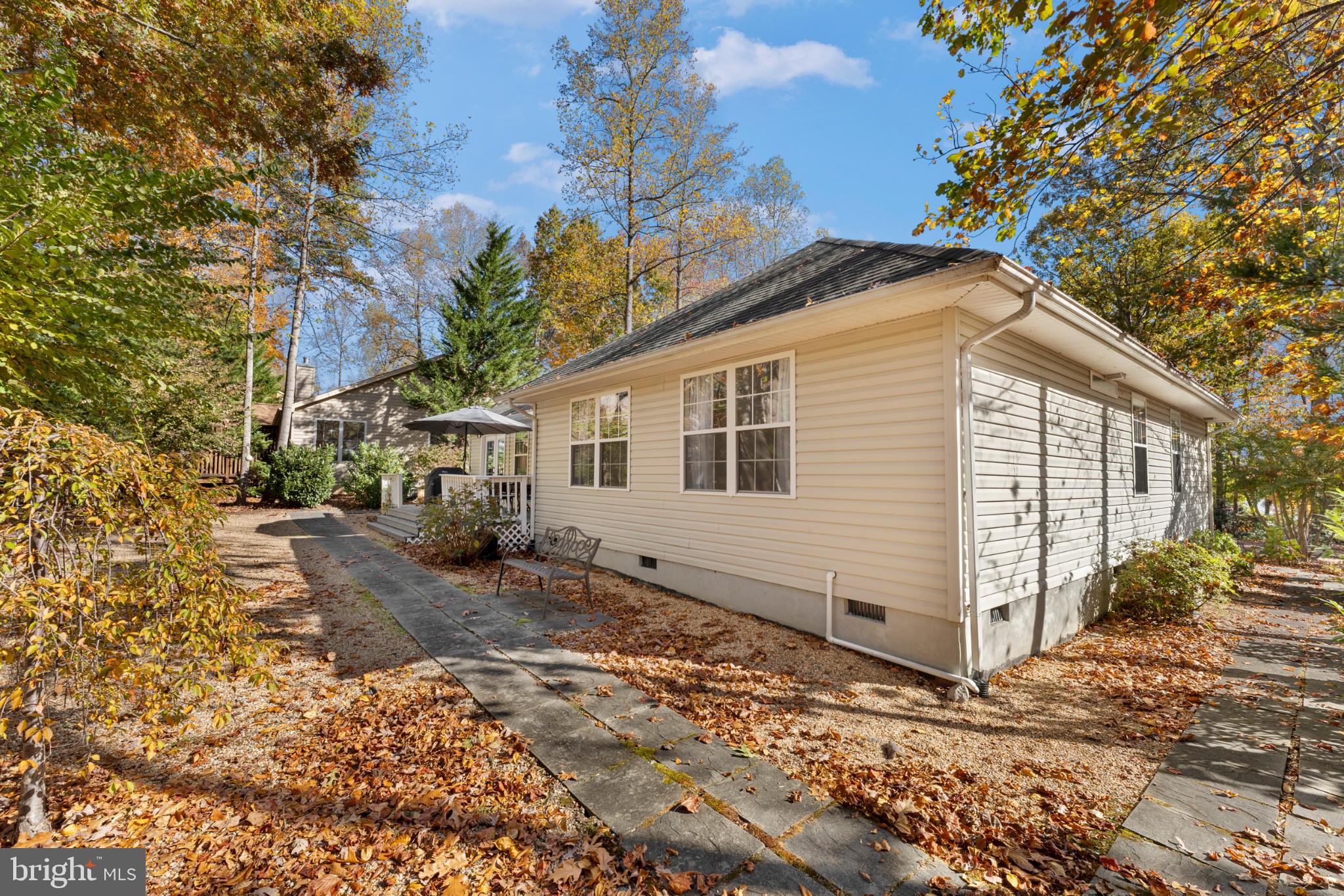 214 Monument Road Locust Grove, VA 22508 - Photo 40 of 48 Charming home nestled among autumn leaves.