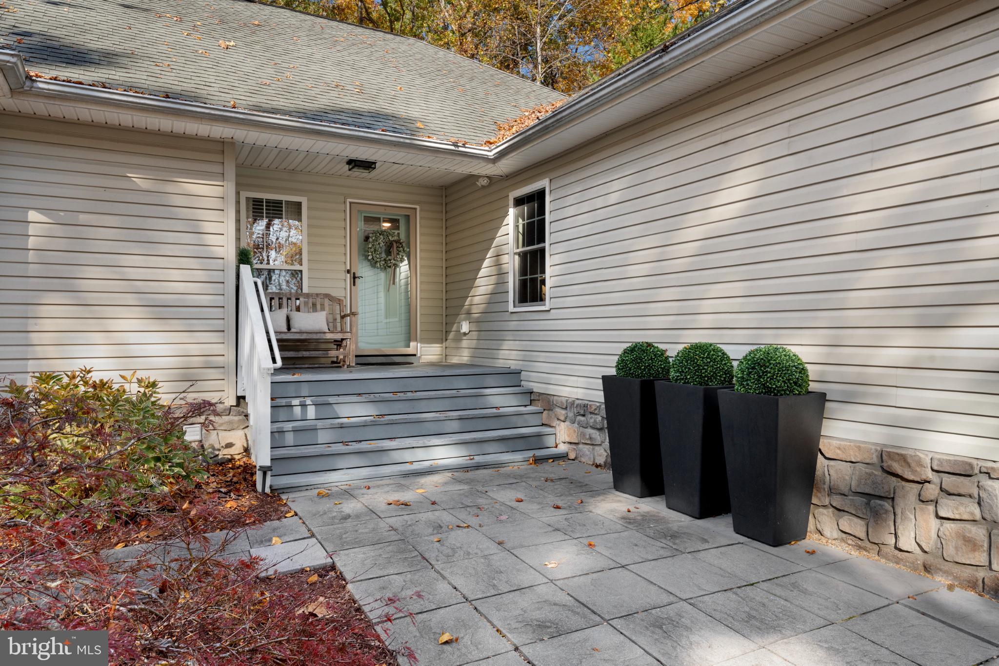 214 Monument Road Locust Grove, VA 22508 - Photo 44 of 48 Charming entryway with lush greenery.