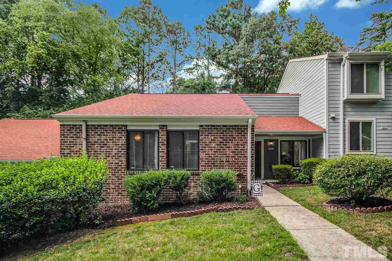 5863 Branchwood Road Raleigh, NC 27609 - Photo 1 of 30 a view of a house with a yard