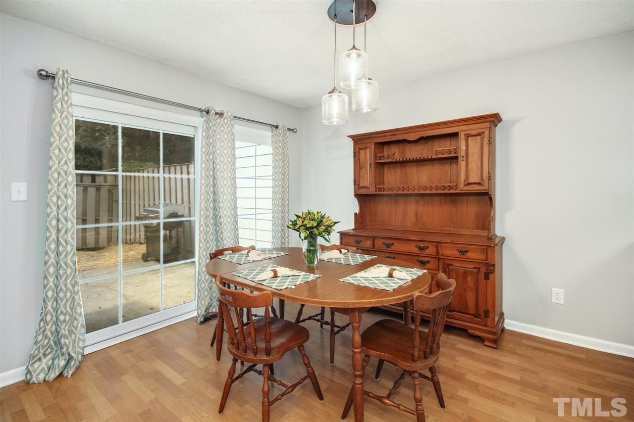 5863 Branchwood Road Raleigh, NC 27609 - Photo 11 of 30 a dining room with furniture and window