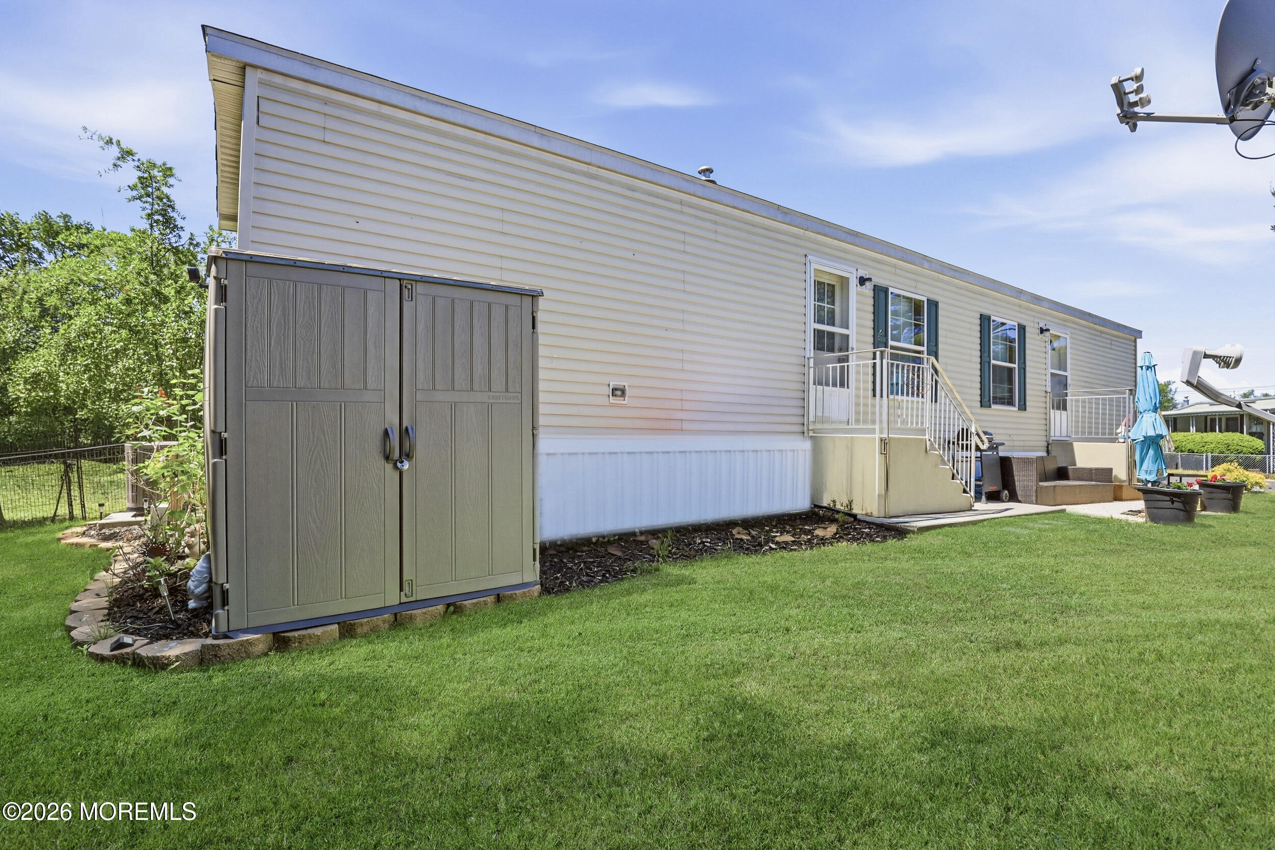 40 Locust Grove Hazlet, NJ 07730 - Photo 14 of 15 a view of a house with backyard and porch